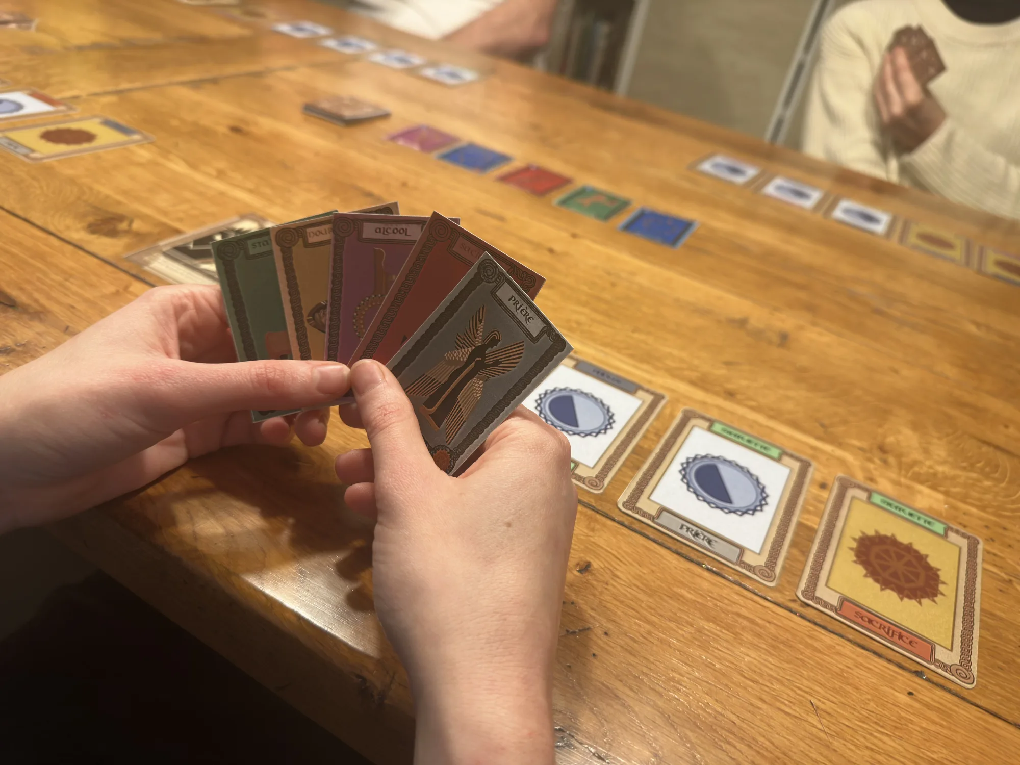 Main de cartes « Offrande »